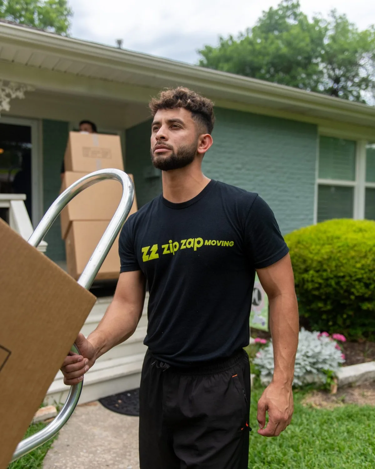 Zip Zap Moving crew loading a moving truck in McKinney TX