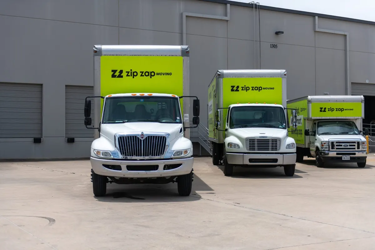 Zip Zap box trucks staged at a loading dock